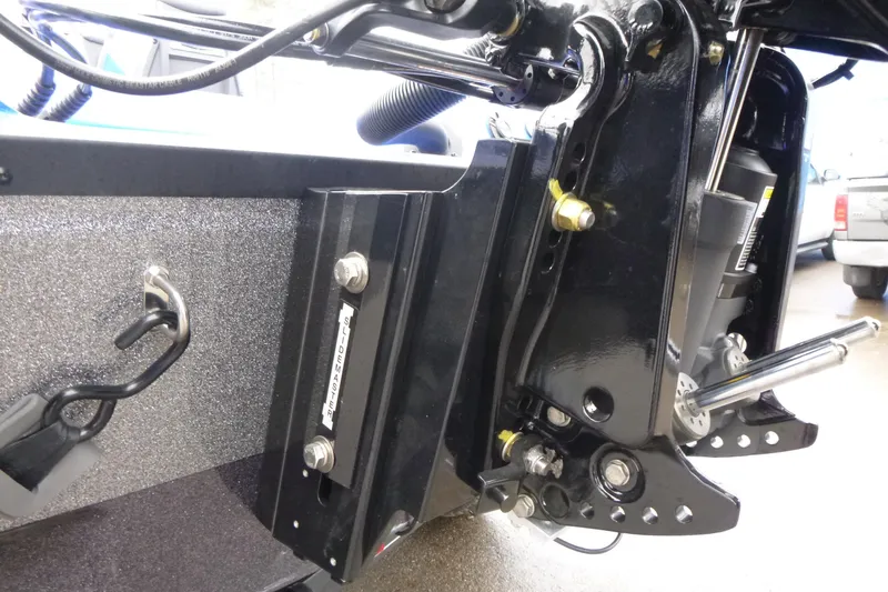 Slide: The Image of Close-up of 2026 Ranger 620FS Cup Equipped boat's hydraulic system and mounting hardware. - 11