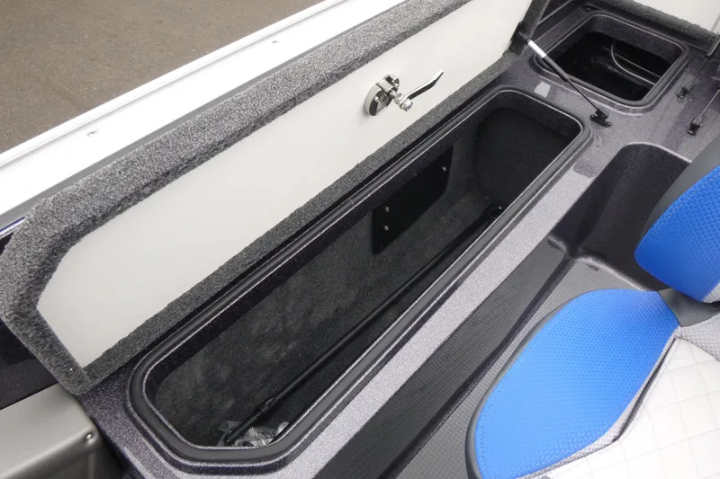 Slide: The Image of 2026 Ranger 620FS Cup Equipped boat storage compartment with blue seating detail. - 18
