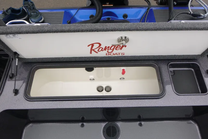 Slide: The Image of 2026 Ranger 620FS Cup Equipped boat storage compartment with open lid. - 19