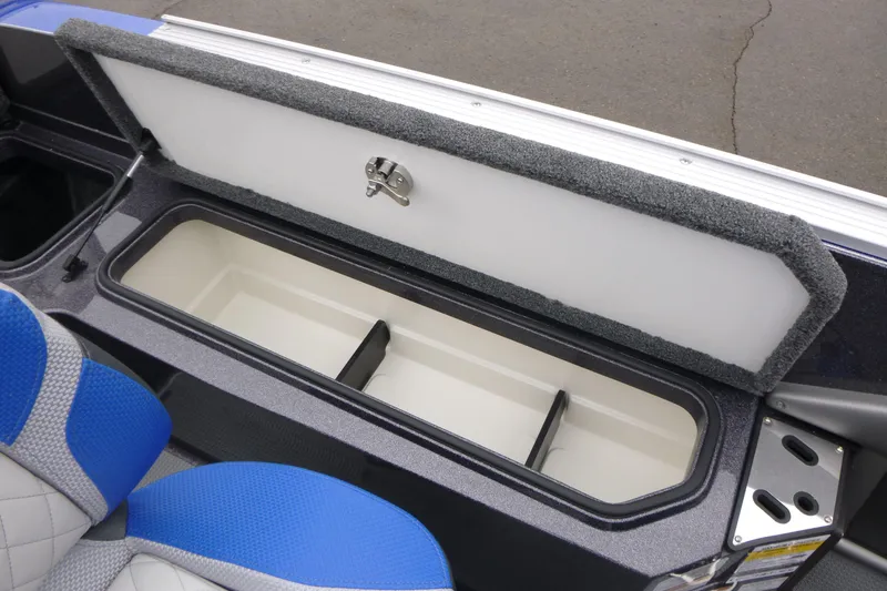 Slide: The Image of 2026 Ranger 620FS Cup Equipped boat storage compartment with open lid and blue seating. - 20