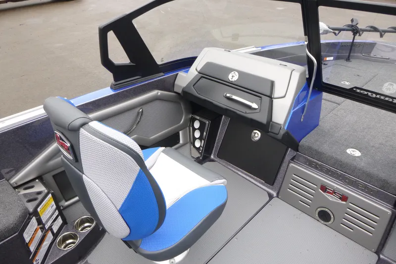 Slide: The Image of 2026 Ranger 620FS Cup Equipped boat interior with blue and gray seating and dashboard. - 28