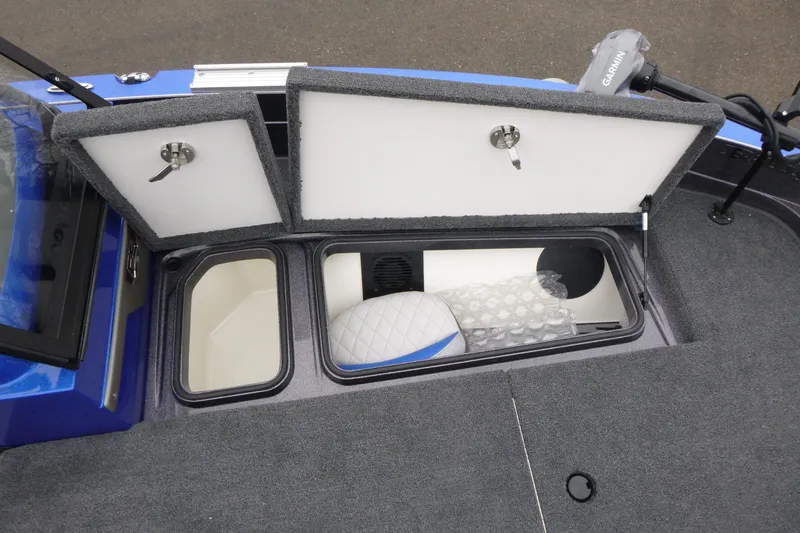 Slide: The Image of 2026 Ranger 620FS Cup Equipped boat storage compartments open, showcasing interior features. - 33