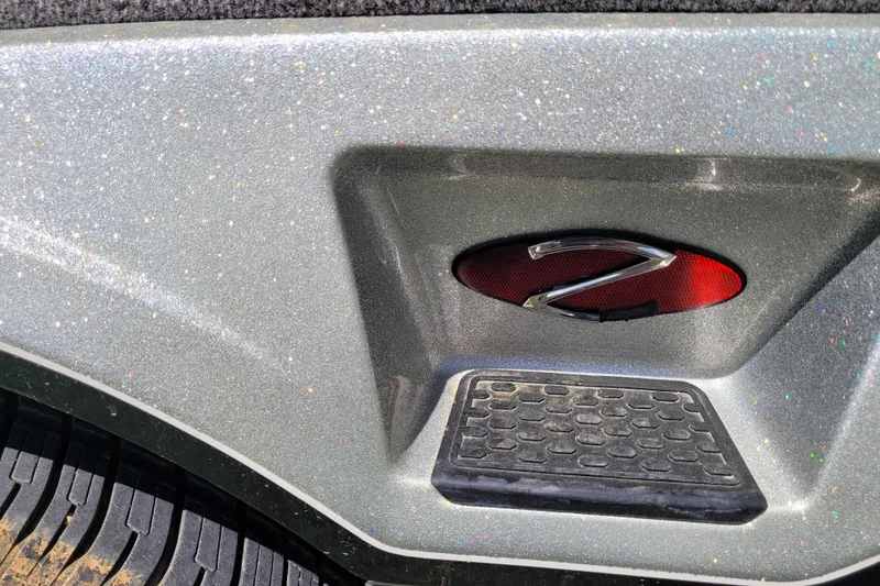 Slide: The Image of 2020 Ranger Z521L boat detail with metallic finish and step pad. - 10