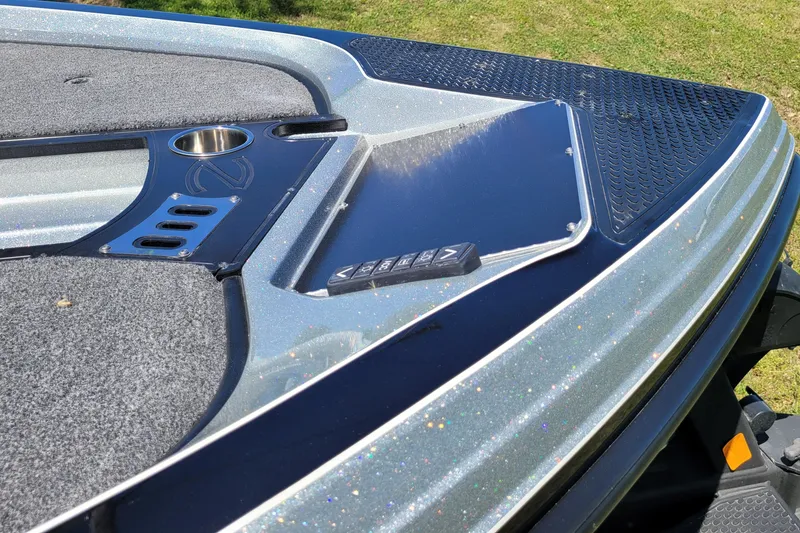 Slide: The Image of 2020 Ranger Z521L boat deck with cup holder and control panel. - 14