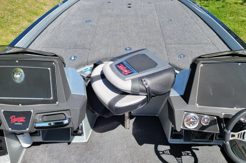 Slide: The Image of 2020 Ranger Z521L boat interior with dual consoles and seating. - 27