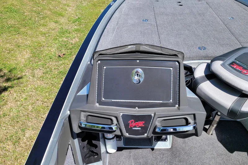 Slide: The Image of 2020 Ranger Z521L boat deck with storage compartment and seating. - 28