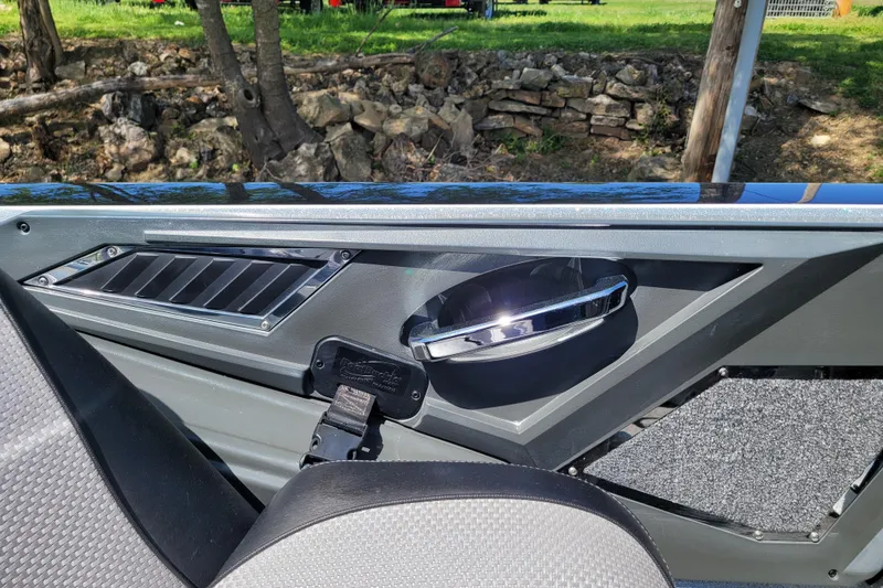 Slide: The Image of 2020 Ranger Z521L boat interior detail with sleek design and chrome accents. - 30