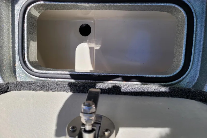Slide: The Image of Open storage compartment in 2020 Ranger Z521L boat. - 33