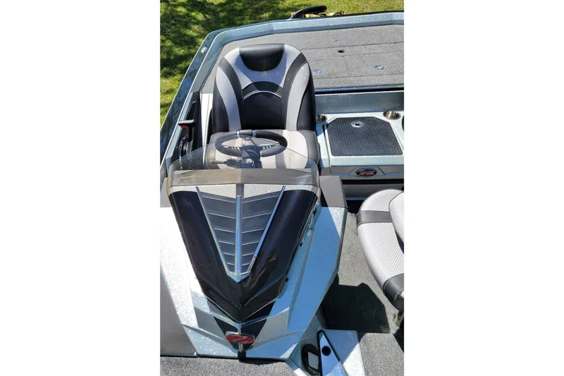 Slide: The Image of 2020 Ranger Z521L boat cockpit with steering wheel and seating. - 35