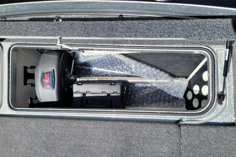 Slide: The Image of 2020 Ranger Z521L storage compartment with equipment and bubble wrap. - 41