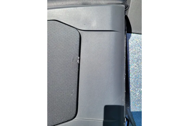 Slide: The Image of Close-up of 2020 Ranger Z521L boat interior detail, featuring textured black surface. - 42