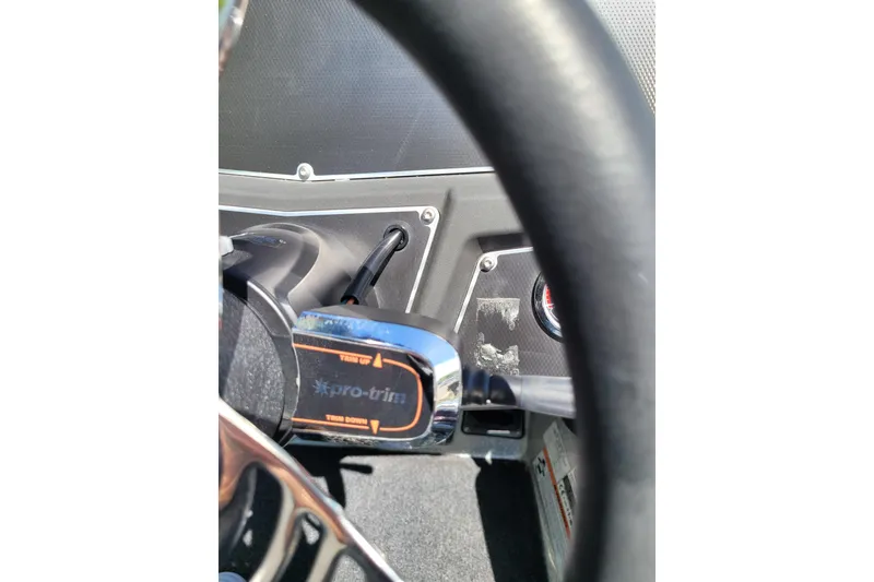 Slide: The Image of 2020 Ranger Z521L boat steering wheel and Pro-Trim control detail. - 45