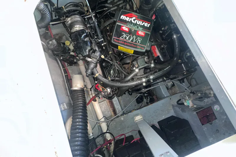 Slide: The Image of Engine compartment of 1987 Sea Ray 300 Sundancer with MerCruiser Alpha One 260 V8 engine. - 32