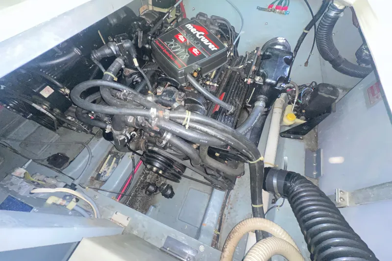 Slide: The Image of Engine compartment of a 1987 Sea Ray 300 Sundancer with MerCruiser engine. - 33