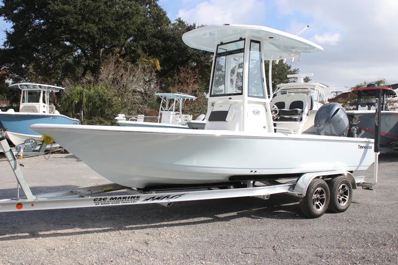 The Image of 2026 Tidewater 2110 Bay Max boat on trailer, parked outdoors. - 0