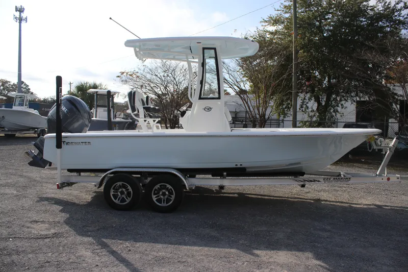 Slide: The Image of 2026 Tidewater 2110 Bay Max boat on trailer, side view, outdoors. - 10