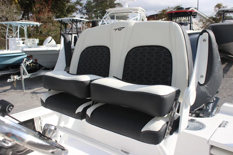 Slide: The Image of 2026 Tidewater 2110 Bay Max boat seats with black and white upholstery. - 18