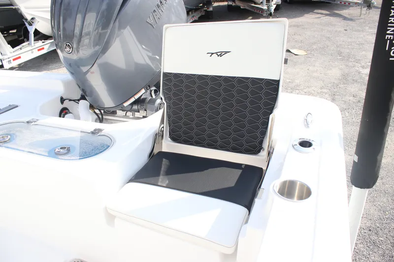Slide: The Image of 2026 Tidewater 2110 Bay Max boat seat with Yamaha engine in background. - 23