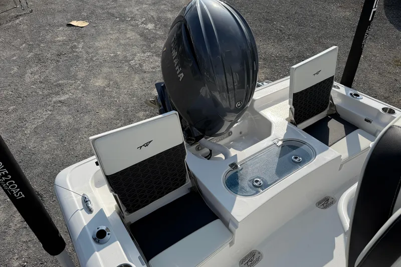 Slide: The Image of 2026 Tidewater 2110 Bay Max boat with Yamaha engine and seating. - 28