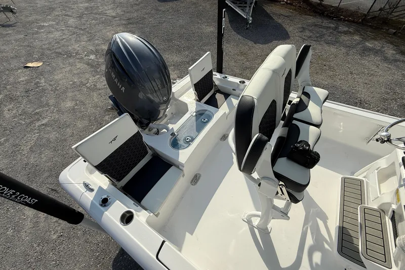 Slide: The Image of 2026 Tidewater 2110 Bay Max boat interior with Yamaha engine and seating. - 29