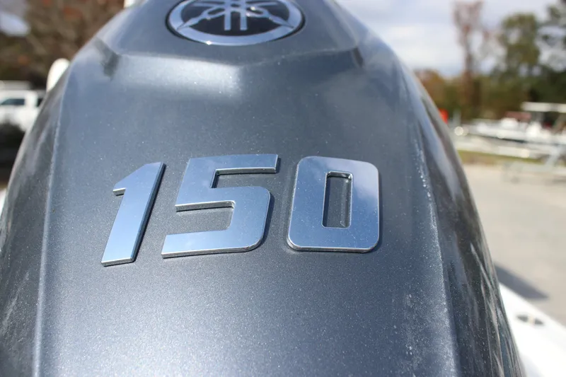 Slide: The Image of Close-up of Yamaha 150 engine on 2026 Tidewater 2110 Bay Max boat. - 8