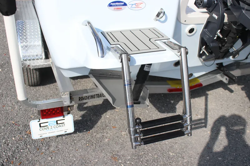 Slide: The Image of 2026 Tidewater 2110 Bay Max boat with ladder and trailer detail. - 9