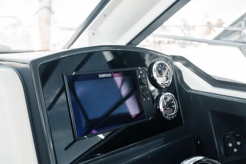 Slide: The Image of Manufacturer Provided Image: Dashboard of 2025 Bayliner Trophy T23 Explorer with Simrad display and gauges. - 3