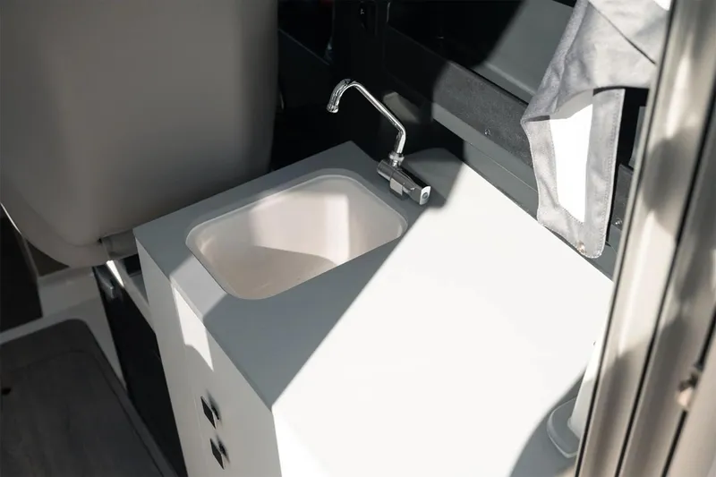 Slide: The Image of Manufacturer Provided Image: 2025 Bayliner Trophy T23 Explorer boat interior sink and faucet. - 5