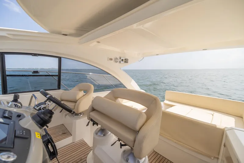 Slide: The Image of Interior view of 2013 Beneteau GRAN TURISMO 38 yacht with ocean backdrop. - 12