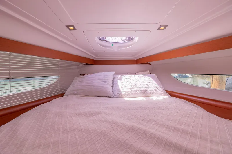 Slide: The Image of Luxurious cabin interior of 2013 Beneteau Gran Turismo 38 yacht with cozy bedding. - 23
