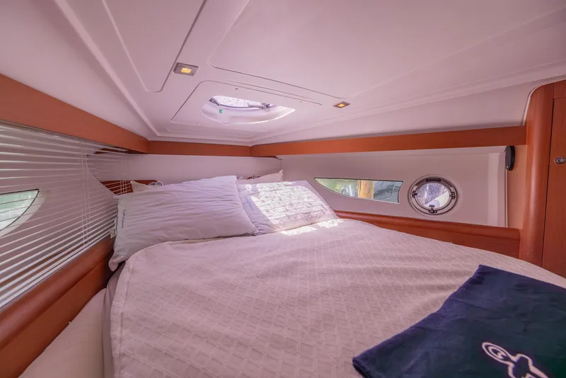 Slide: The Image of Luxurious cabin interior of 2013 Beneteau Gran Turismo 38 yacht with cozy bedding. - 35