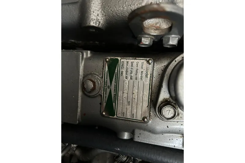 Slide: The Image of Close-up of a 1973 Willard 30 engine plate with specifications. - 10