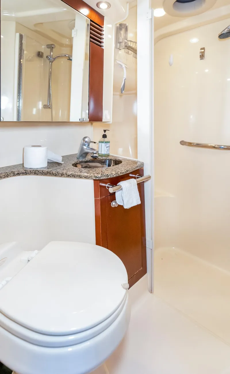 Slide: The Image of Luxurious bathroom in 2006 Sea Ray 44 Sedan Bridge yacht with modern fixtures. - 26