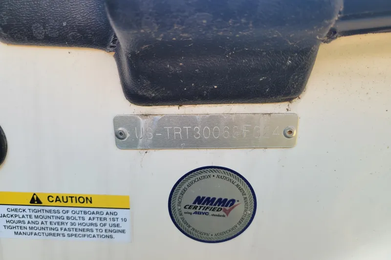 Slide: The Image of 2024 Triton 179 TrX boat identification plate with caution and certification labels. - 18