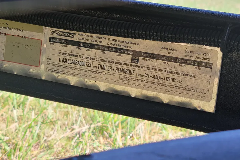 Slide: The Image of Label on a 2024 Triton 179 TrX trailer, showing specifications and manufacturing details. - 3