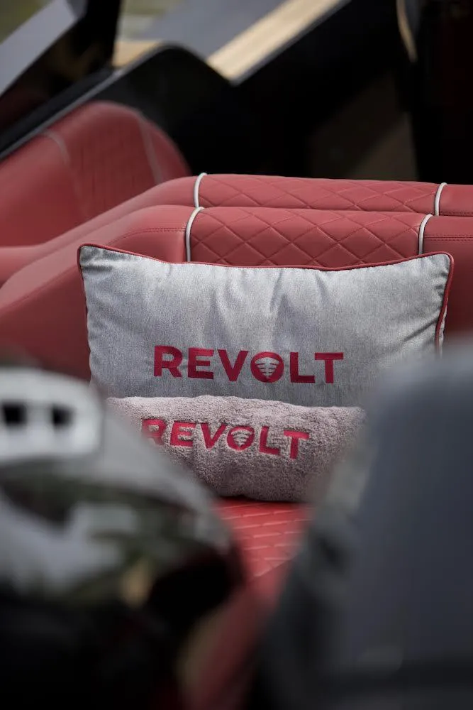 Slide: The Image of Red leather interior of 2023 Revolt Comfort 47 with branded cushion. - 13