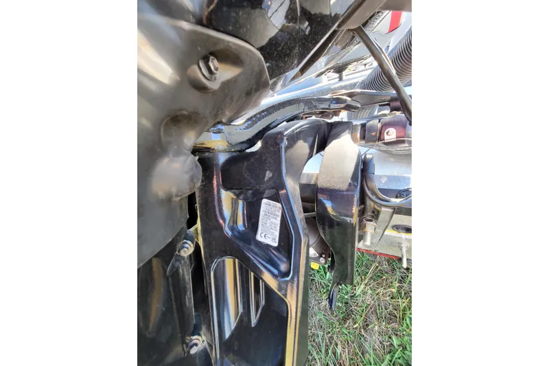 Slide: The Image of Close-up of 2024 Triton 179 TrX boat engine components. - 3