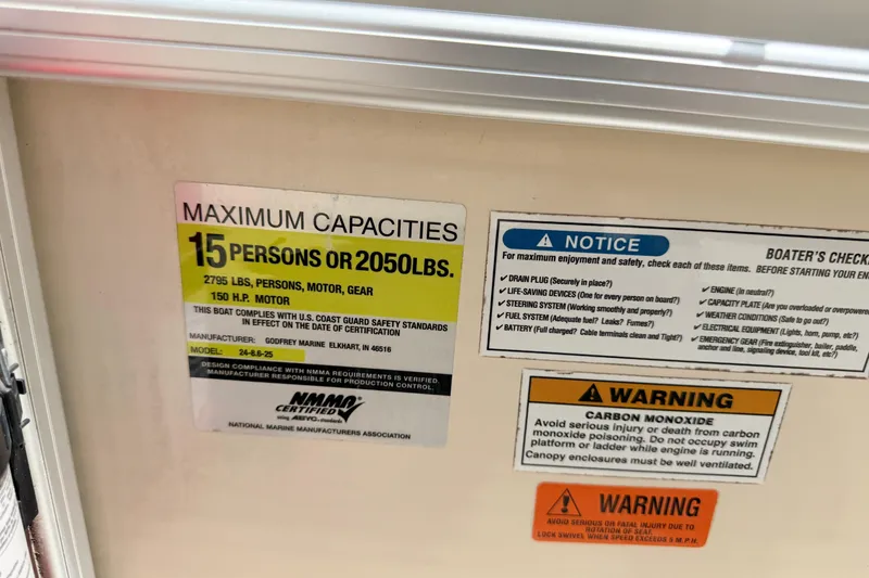 Slide: The Image of 2005 Aqua Patio 240 capacity label showing limits and safety warnings. - 13