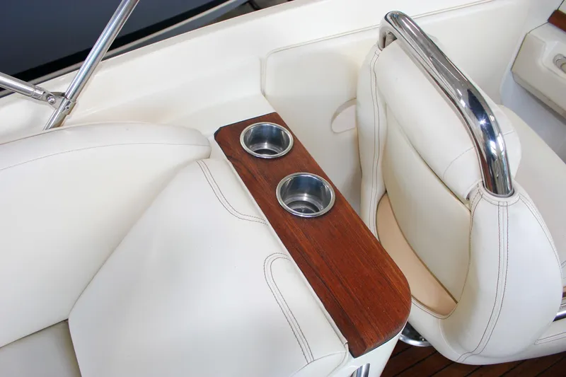 Slide: The Image of 2011 Chris-Craft Corsair 28 boat propellers in a workshop setting. - 14