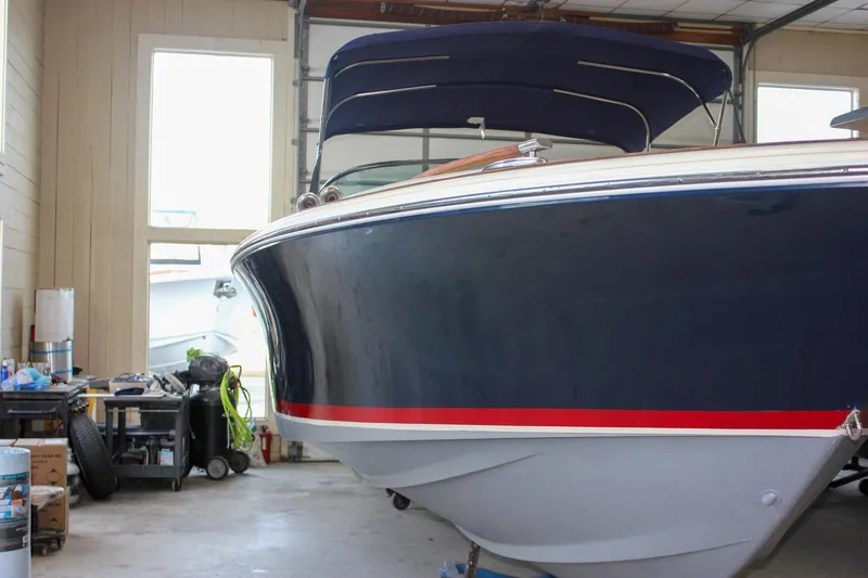 Slide: The Image of 2011 Chris-Craft Corsair 28 boat displayed at Harborside Yacht Sales. - 2