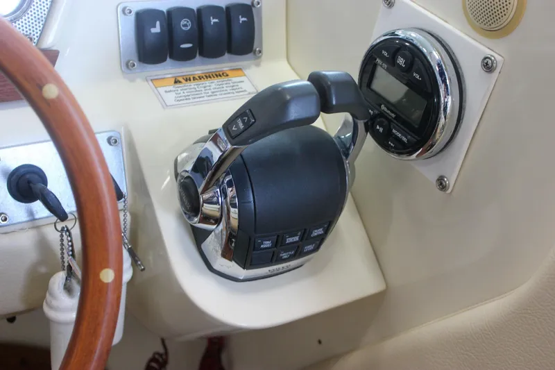 Slide: The Image of Fire extinguisher in 2011 Chris-Craft Corsair 28 boat interior compartment. - 36