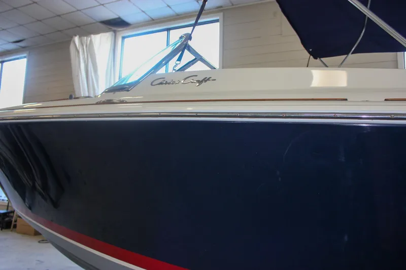 Slide: The Image of 2011 Chris-Craft Corsair 28 boat radio and microphone system. - 44