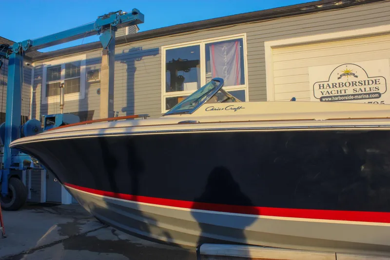 Slide: The Image of 2011 Chris-Craft Corsair 28 boat at Harborside Yacht Sales marina. - 79