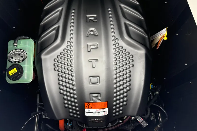 Slide: The Image of 2026 Moomba Max engine with Raptor cover, showcasing super ultra-low emission technology. - 12