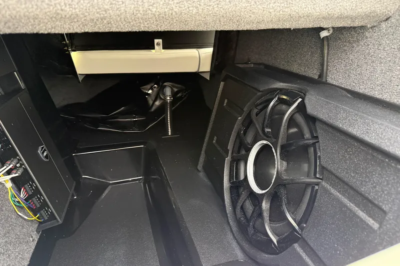 Slide: The Image of Interior view of 2026 Moomba Max boat featuring audio system and wiring. - 20