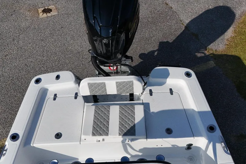 Slide: The Image of Overhead view of 2026 BlackJack 224 boat's rear deck and motor. - 5