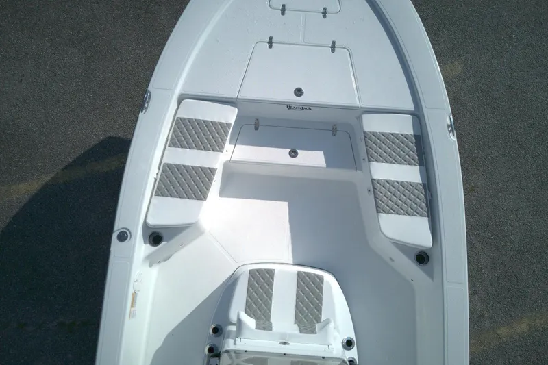 Slide: The Image of Top view of 2026 BlackJack 224 boat deck with cushioned seating. - 7