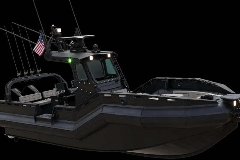 Slide: The Image of DGS 777 Military Version 2022 boat with American flag, advanced design, and tactical features. - 6