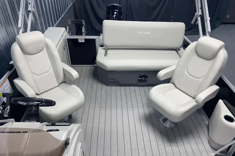 Slide: The Image of 2025 Sylvan 8 boat interior with plush white seating and modern design. - 5