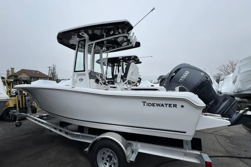 The Image of 2026 Tidewater 198 CC Adventure boat on trailer, side view. - 1